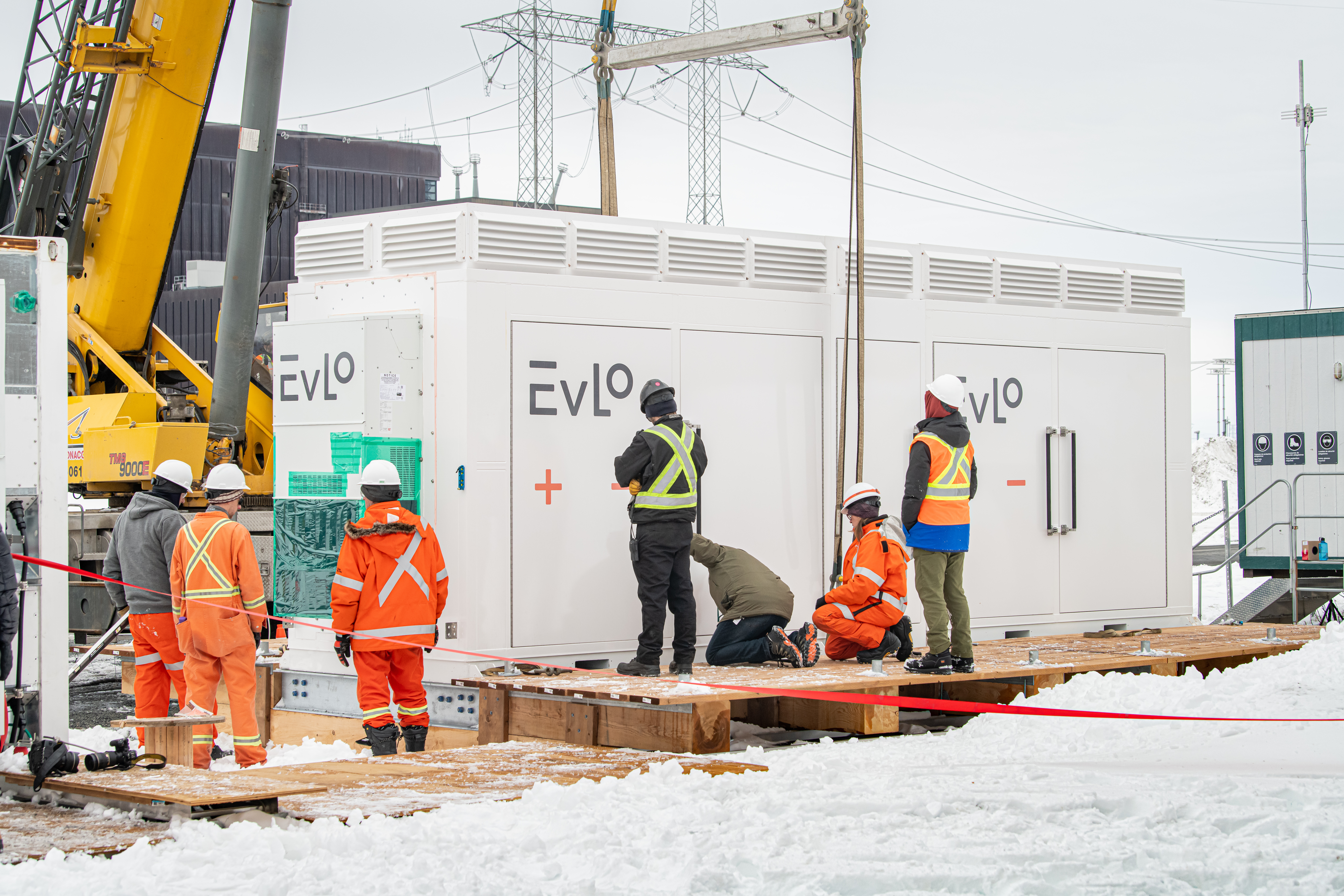 Workers installing an EVLO unit